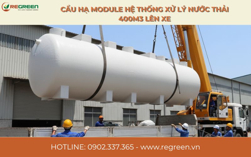 Cẩu hạ module hệ thống xử lý nước thải 400m3 lên xe.